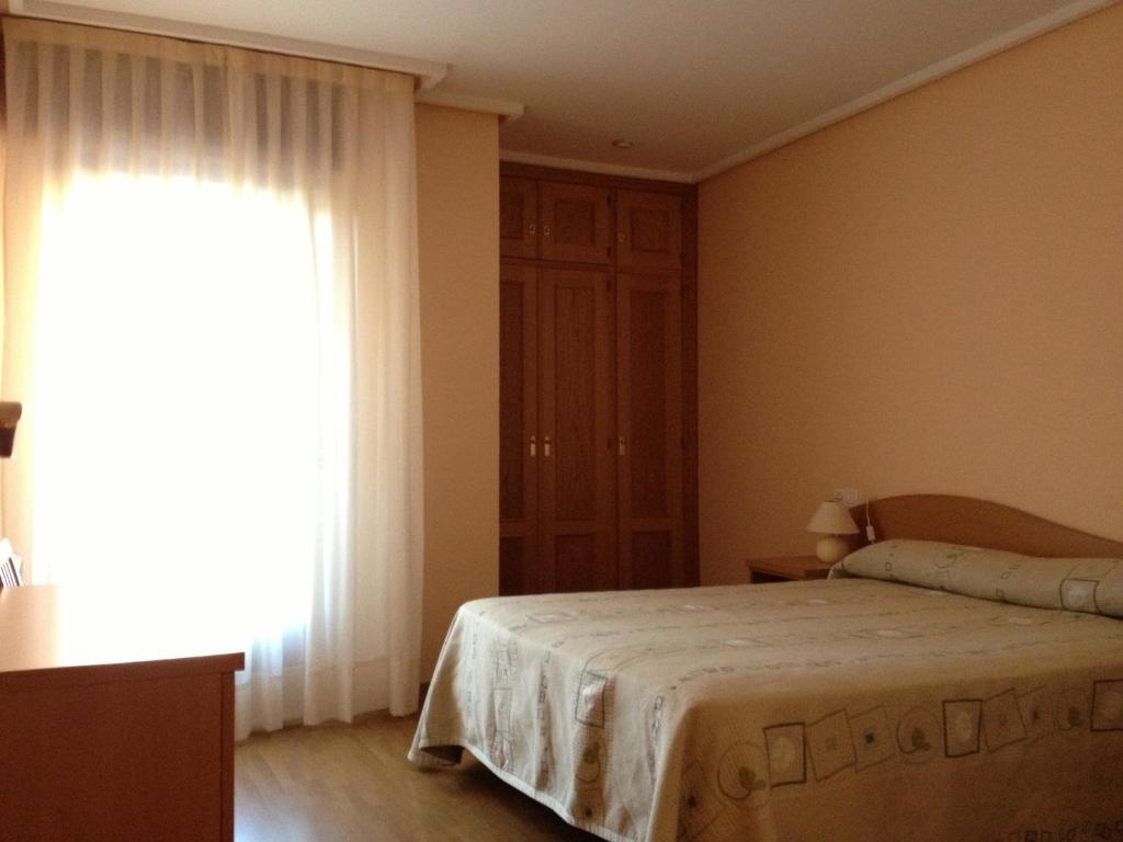 Apartamentos Turisticos Puerta De Leon Room photo